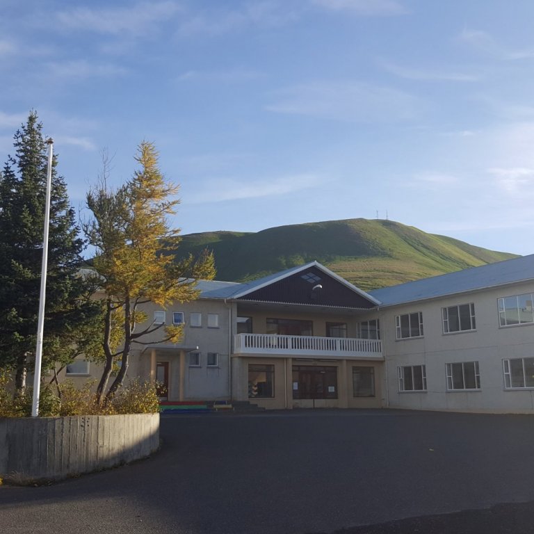 Skólinn okkar - Our school